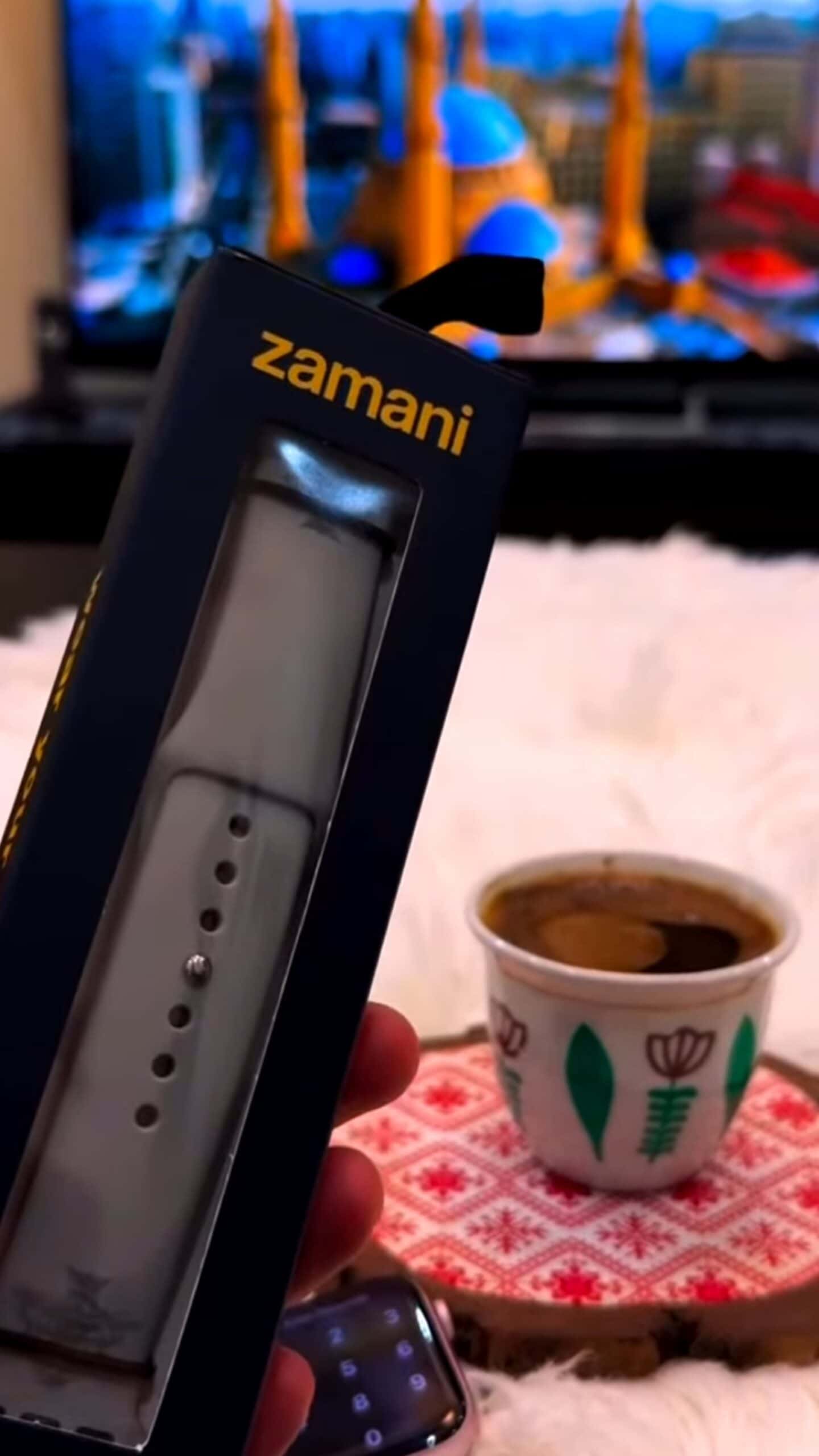 1. Stylish Zamani fitness tracker in packaging with coffee cup background.