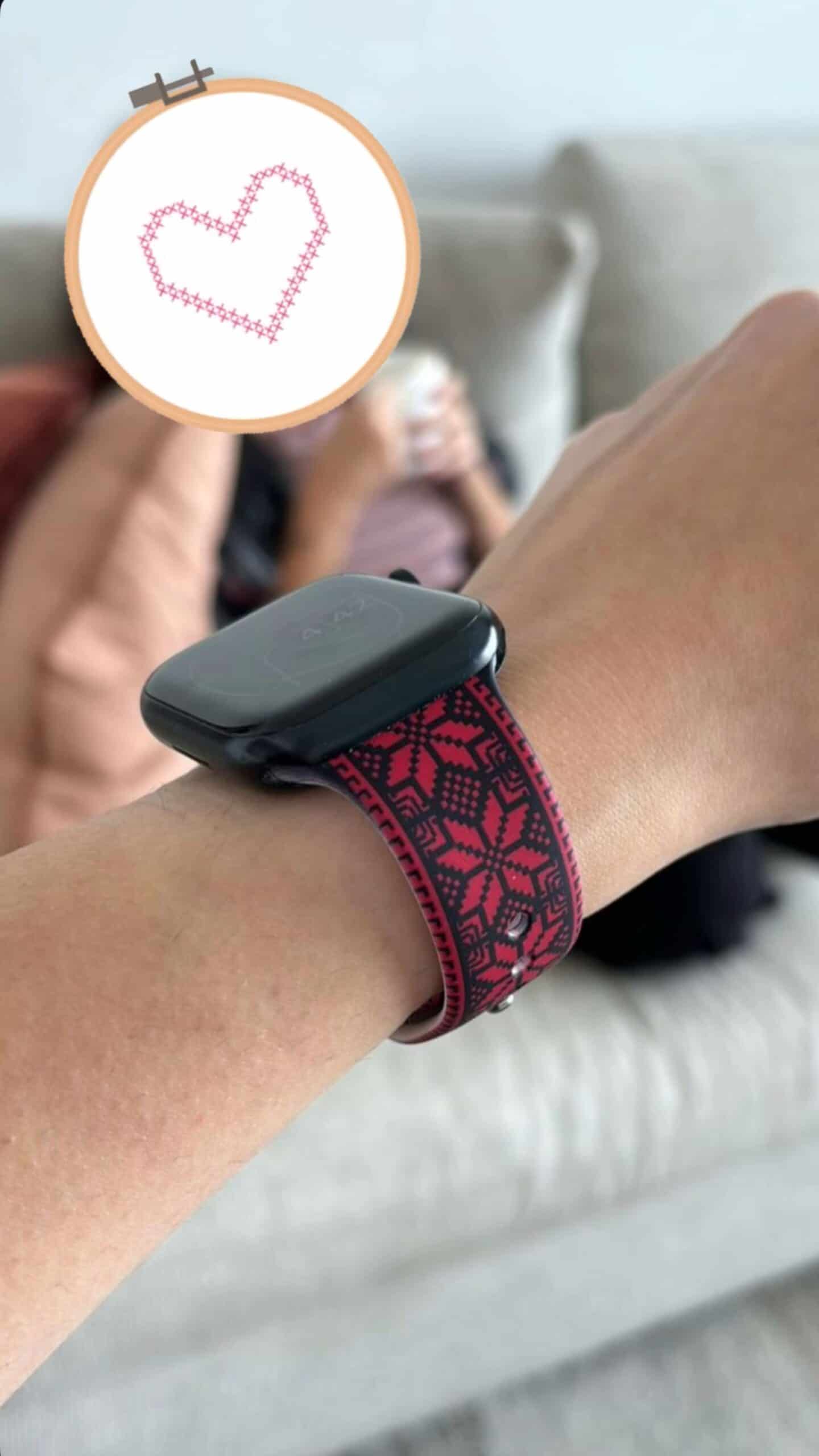 Heart embroidery on smartwatch strap in vibrant pink and black, designed for stylish, personalized accessories.