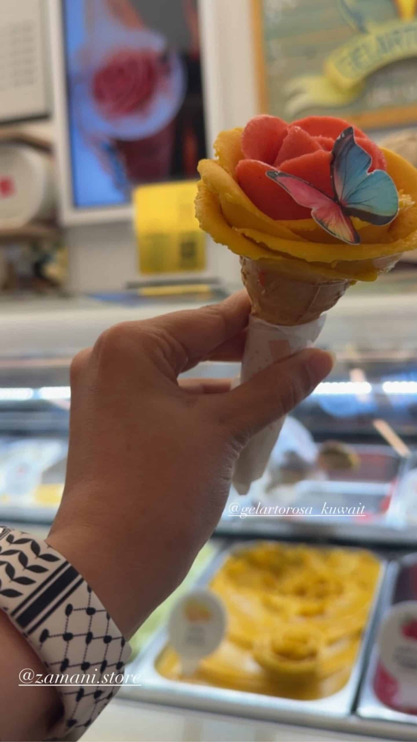 Colorful rose-shaped ice cream with butterfly decoration at Zamanistore.