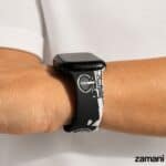 Dubai It Apple Watch band worn on the wrist, black silicone printed with the Dubai coastline and Palm Jumeirah