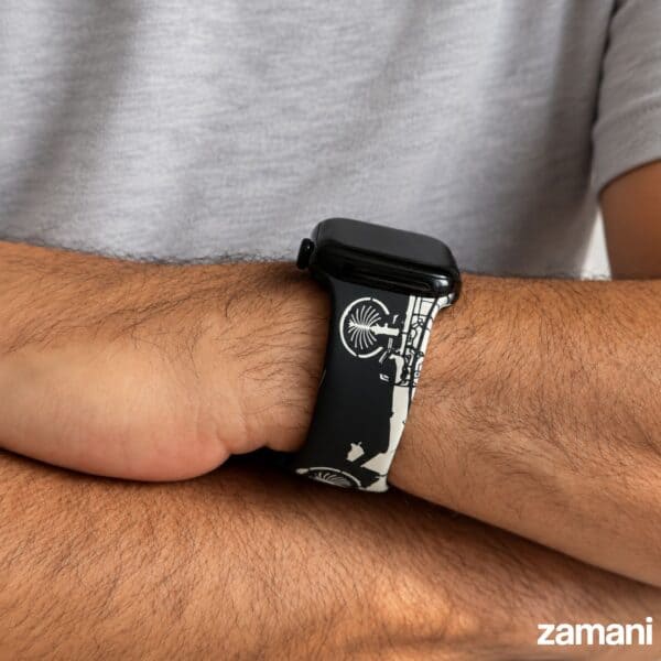 Dubai It Apple Watch band worn with arms crossed, Palm Jumeirah print
