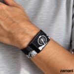 Dubai It Whoop band close up on the wrist, Palm Jumeirah and road grid print