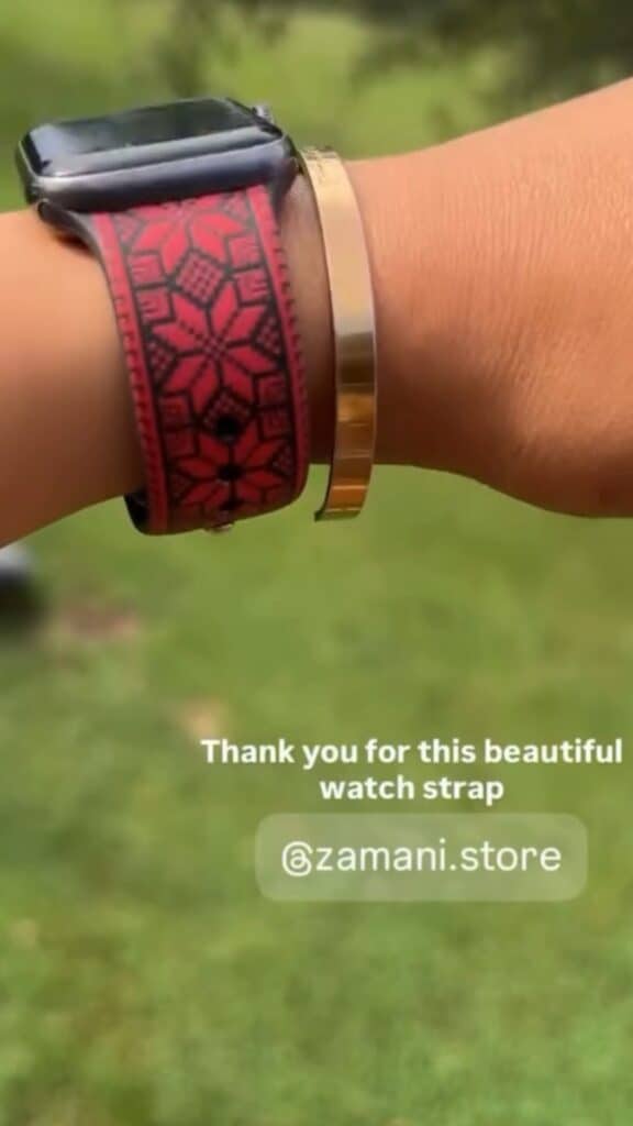 Customer wearing the red Tatreez Apple Watch band