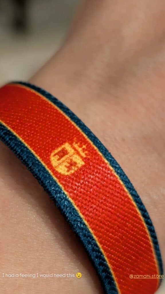 Customer wearing the Spain Beautiful Game wristband